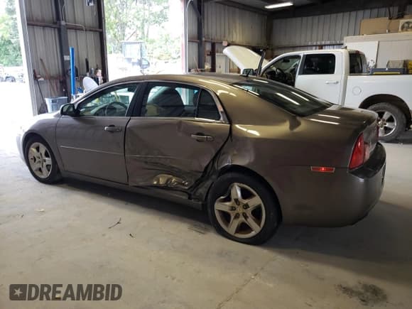 ✅ 2011 Chevrolet Malibu 1LS • VIN: 1G1ZB5E17BF265605 • Lot: 63680094. Listed on Copart with 149,872 mi. Free auction sales archive from the USA and detailed vehicle history report at DreamBid. Image 2.