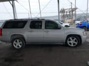 ✅ 2007 Chevrolet Suburban LT • VIN: 1GNFC16027J221478 • Lot: 42795291. Listed on IAAI with 160,596 mi. Free auction sales archive from the USA and detailed vehicle history report at DreamBid. Image 13.
