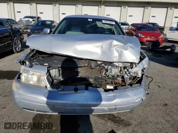 ✅ 2001 Ford Crown Victoria Police Interceptor • VIN: 2FAFP71W71X188154 • Лот: 79897894. Опубликован ранее на Copart с пробегом 72 916 миль. Бесплатный доступ к архиву аукционных продаж из США и подробный отчёт об истории автомобиля на DreamBid. Изображение 5.