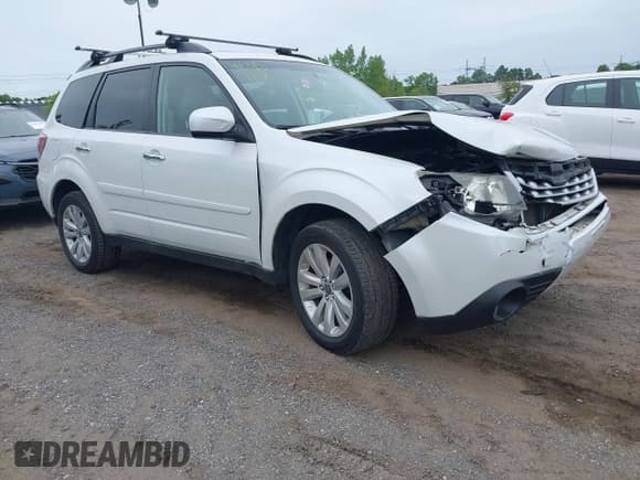 ✅ 2012 Subaru Forester X Premium • VIN: JF2SHADC8CH401203 • Lot: 42351106. Listed on IAAI with 152,122 mi. Free auction sales archive from the USA and detailed vehicle history report at DreamBid. Image 1.