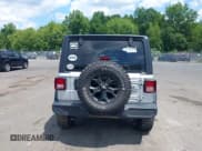 ✅ 2023 Jeep Wrangler Sport S • VIN: 1C4HJXDN2PW615882 • Lot: 42791138. Listed on IAAI with 21,993 mi. Free auction sales archive from the USA and detailed vehicle history report at DreamBid. Image 16.