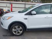 ✅ 2014 Ford Escape SE • VIN: 1FMCU9G90EUC00429 • Lot: 43505870. Listed on IAAI with 120,101 mi. Free auction sales archive from the USA and detailed vehicle history report at DreamBid. Image 19.
