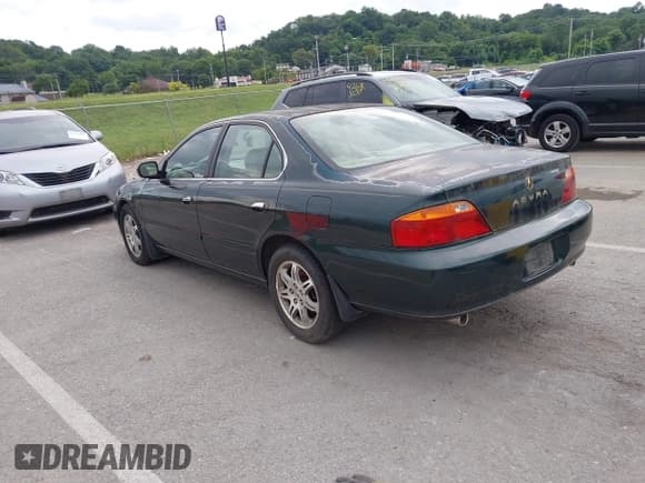 ✅ 2001 Acura TL • VIN: 19UUA56601A018258 • Lot: 42694524. Listed on IAAI with 215,580 mi. Free auction sales archive from the USA and detailed vehicle history report at DreamBid. Image 3.