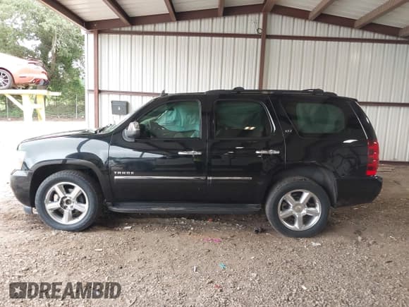 ✅ 2013 Chevrolet Tahoe LTZ • VIN: 1GNSCCE03DR122449 • Lot: 42860317. Listed on IAAI with 181,518 mi. Free auction sales archive from the USA and detailed vehicle history report at DreamBid. Image 14.