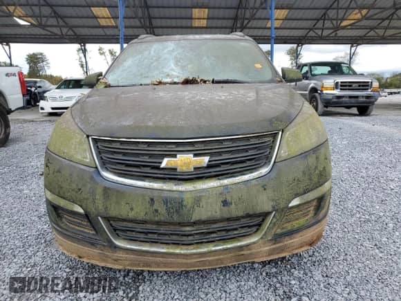 2015 Chevrolet Traverse LS z VIN 1GNKRFKD6FJ197476, wystawiony jako Copart lot #90977255 z przebiegiem 171 403 mil mil oraz Czysty tytuł • Clean title. Historia ofert i sprzedaży dostępna na DreamBid. Obrazek 5.