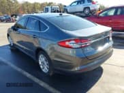 ✅ 2017 Ford Fusion Hybrid SE • VIN: 3FA6P0LU8HR260068 • Lot: 43685195. Listed on IAAI with 211,056 mi. Free auction sales archive from the USA and detailed vehicle history report at DreamBid. Image 3.