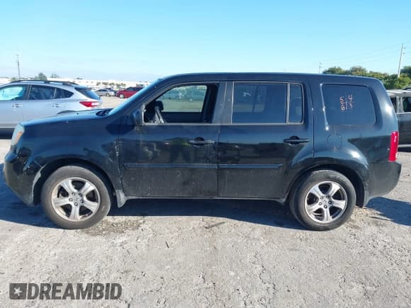 ✅ 2013 Honda Pilot EX-L • VIN: 5FNYF3H66DB017923 • Lot: 41677898. Listed on IAAI with 219,037 mi. Free auction sales archive from the USA and detailed vehicle history report at DreamBid. Image 15.