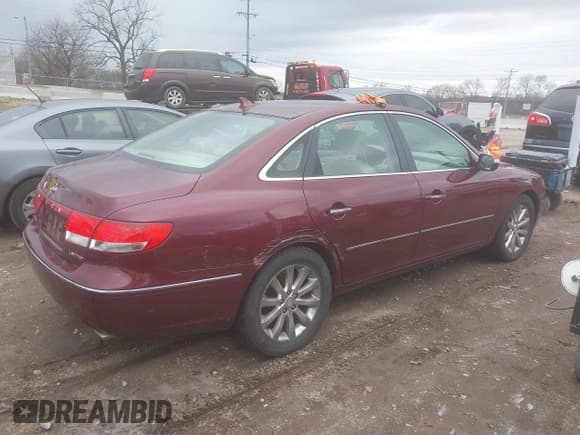 ✅ 2009 Hyundai Azera Limited • VIN: KMHFC46F19A373801 • Lot: 41481510. Listed on IAAI with 186,248 mi. Free auction sales archive from the USA and detailed vehicle history report at DreamBid. Image 4.