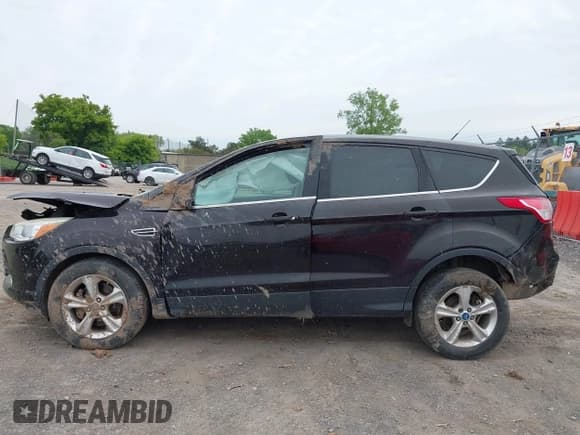 ✅ 2013 Ford Escape SE • VIN: 1FMCU9G96DUC18660 • Lot: 42398855. Listed on IAAI with 144,490 mi. Free auction sales archive from the USA and detailed vehicle history report at DreamBid. Image 15.