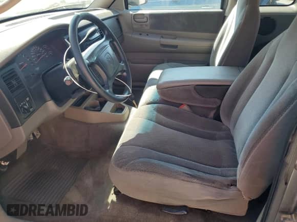 2002 Dodge Dakota Sport z VIN 1B7GL32XX2S588725, wystawiony jako Copart lot #65541345 z przebiegiem 205 568 mil mil oraz Szkoda całkowita • Salvage title. Historia ofert i sprzedaży dostępna na DreamBid. Obrazek 7.