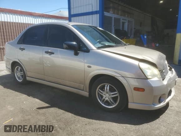 ✅ 2006 Suzuki Aerio Premium • VIN: JS2RA62S165300427 • Лот: 57363605. Опубликован ранее на Copart с пробегом 141 824 миль. Бесплатный доступ к архиву аукционных продаж из США и подробный отчёт об истории автомобиля на DreamBid. Изображение 4.