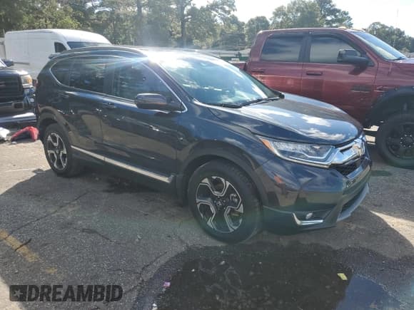 ✅ 2018 Honda CR-V Touring • VIN: 7FARW1H97JE045135 • Lot: 90251425. Listed on Copart with 62,197 mi. Free auction sales archive from the USA and detailed vehicle history report at DreamBid. Image 4.