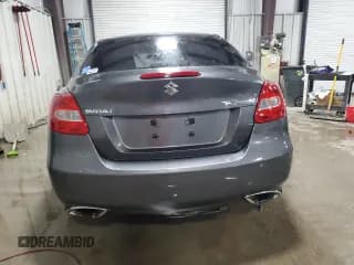 ✅ 2010 Suzuki Kizashi • VIN: JS2RE9A77A6100612 • Lot: 42969175. Wystawiony na Copart z przebiegiem 106 813 mil. Bezpłatny archiwum sprzedaży aukcyjnych z USA i szczegółowy raport historii pojazdu na DreamBid. Zdjęcie 6.
