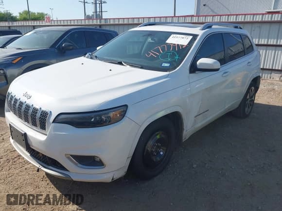 ✅ 2019 Jeep Cherokee Overland • VIN: 1C4PJMJN5KD304899 • Лот: 41977072. Опубликован ранее на IAAI с пробегом 75 830 миль. Бесплатный доступ к архиву аукционных продаж из США и подробный отчёт об истории автомобиля на DreamBid. Изображение 2.