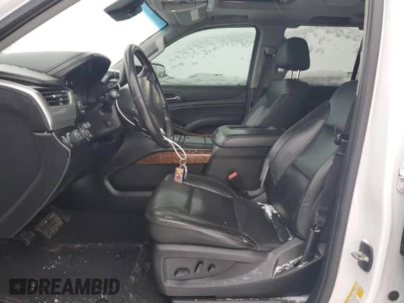 2020 Chevrolet Tahoe Premier with VIN 1GNSKCKJXLR182971, listed as a Copart auction lot 87268634 with 210,000 mi miles and Salvage title. Bid and sale history available at DreamBid. Image 7.