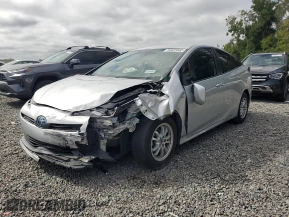 2021 Toyota Prius L Eco with VIN JTDKAMFU0M3141002, listed as a Copart auction lot 84425805 with 73,095 mi miles and Clean title. Bid and sale history available at DreamBid. Image 1.