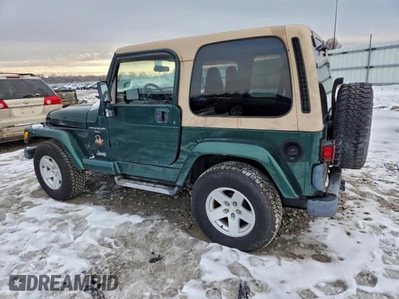 ✅ 2001 Jeep Wrangler Sahara • VIN: 1J4FA59S01P310998 • Лот: 94724805. Опубликован ранее на Copart с пробегом 113 902 миль. Бесплатный доступ к архиву аукционных продаж из США и подробный отчёт об истории автомобиля на DreamBid. Изображение 2.