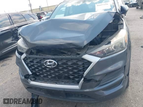 2019 Hyundai Tucson Value with VIN KM8J33A49KU955529, listed as a IAAI auction lot 42947554 with 81,614 mi miles and . Bid and sale history available at DreamBid. Image 12.