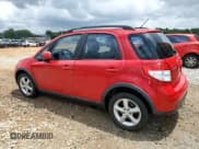 ✅ 2010 Suzuki SX4 • VIN: JS2YA5A32A6300603 • Лот: 61167425. Опубликован ранее на Copart с пробегом 82 403 миль. Бесплатный доступ к архиву аукционных продаж из США и подробный отчёт об истории автомобиля на DreamBid. Изображение 2.