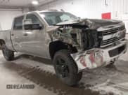 ✅ 2017 Chevrolet Silverado 2500HD Work Truck • VIN: 1GC1KUEG0HF128856 • Lot: 42046701. Listed on IAAI with 200,705 mi. Free auction sales archive from the USA and detailed vehicle history report at DreamBid. Image 1.