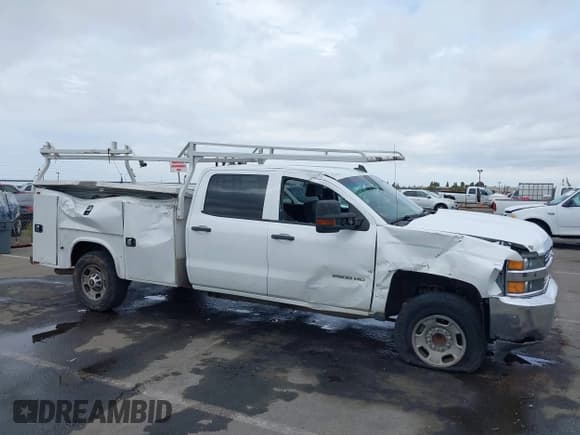 ✅ 2016 Chevrolet Silverado 2500HD Work Truck • VIN: 1GC1CUEG2GF102108 • Lot: 43471361. Listed on IAAI with 185,168 mi. Free auction sales archive from the USA and detailed vehicle history report at DreamBid. Image 6.