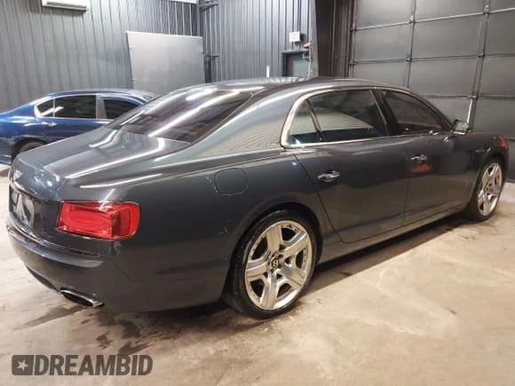 ✅ 2014 Bentley Flying Spur • VIN: SCBEC9ZA5EC091515 • Lot: 42512017. Listed on IAAI with 65,951 mi. Free auction sales archive from the USA and detailed vehicle history report at DreamBid. Image 4.