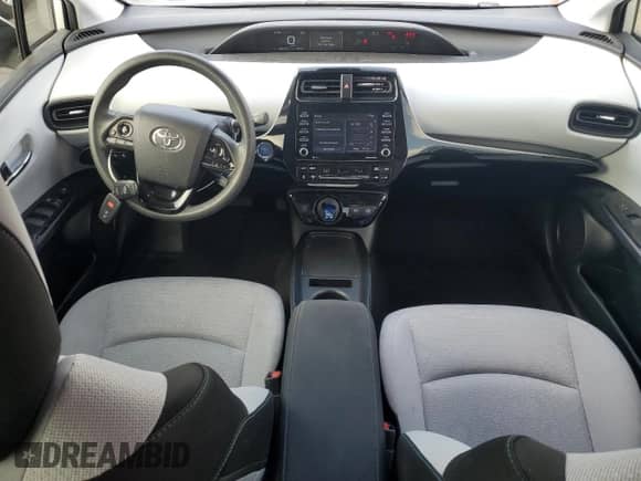 2021 Toyota Prius L Eco with VIN JTDKAMFU9M3139796, listed as a Copart auction lot 71665595 with 89,976 mi miles and Salvage title. Bid and sale history available at DreamBid. Image 8.