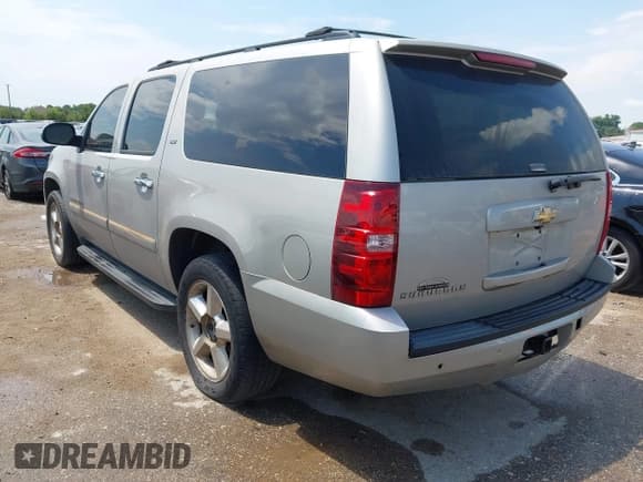 ✅ 2007 Chevrolet Suburban LTZ • VIN: 3GNFC16J77G318878 • Lot: 43017811. Listed on IAAI with 293,693 mi. Free auction sales archive from the USA and detailed vehicle history report at DreamBid. Image 3.