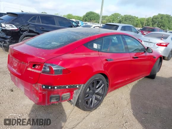 ✅ 2021 Tesla Model S Plaid • VIN: 5YJSA1E60MF447203 • Lot: 42025120. Listed on IAAI with 58,190 mi. Free auction sales archive from the USA and detailed vehicle history report at DreamBid. Image 4.