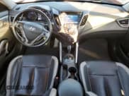 ✅ 2013 Hyundai Veloster Turbo • VIN: KMHTC6AE1DU178091 • Lot: 80265574. Wystawiony na Copart z przebiegiem 147 633 mil. Bezpłatny archiwum sprzedaży aukcyjnych z USA i szczegółowy raport historii pojazdu na DreamBid. Zdjęcie 8.