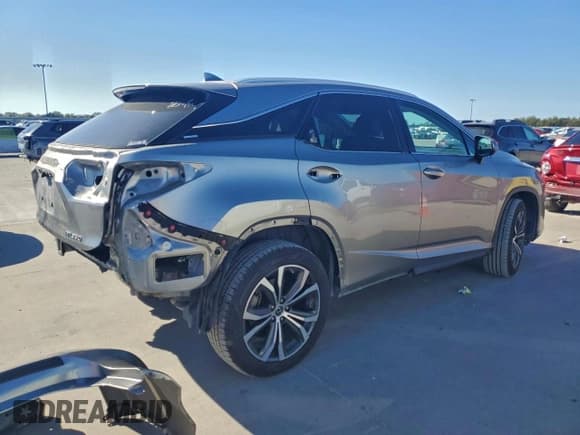 ✅ 2022 Lexus RX 350 • VIN: 2T2HZMDAXNC324133 • Lot: 91471065. Listed on Copart with 74,518 mi. Free auction sales archive from the USA and detailed vehicle history report at DreamBid. Image 3.