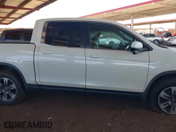 ✅ 2018 Honda Ridgeline RTL-T • VIN: 5FPYK3F6XJB007770 • Lot: 42849205. Listed on IAAI with 77,701 mi. Free auction sales archive from the USA and detailed vehicle history report at DreamBid. Image 13.