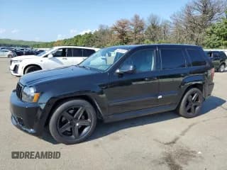 ✅ 2006 Jeep Grand Cherokee SRT-8 • VIN: 1J8HR78356C218029 • Lot: 68977634. Wystawiony na Copart z przebiegiem 64 353 mil. Bezpłatny archiwum sprzedaży aukcyjnych z USA i szczegółowy raport historii pojazdu na DreamBid. Zdjęcie 1.