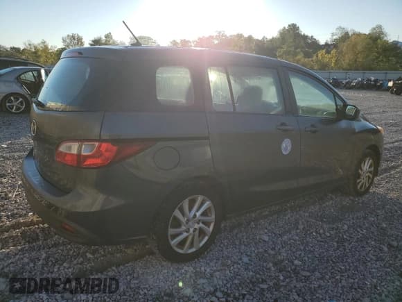 ✅ 2012 Mazda 5 Sport • VIN: JM1CW2BL4C0100945 • Lot: 86185665. Listed on Copart with 132,165 mi. Free auction sales archive from the USA and detailed vehicle history report at DreamBid. Image 3.