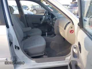 2003 Hyundai Accent GL с VIN KMHCG45C63U463420, выставлен на аукционе IAAI как лот 42356069 с пробегом 97 083 миль миль и . История ставок и продаж доступна на DreamBid. Изображение 5.