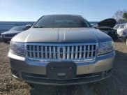 ✅ 2009 Lincoln MKZ • VIN: 3LNHM28T49R613832 • Lot: 92481665. Listed on Copart with 86,381 mi. Free auction sales archive from the USA and detailed vehicle history report at DreamBid. Image 5.