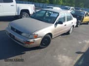 ✅ 1996 Toyota Corolla • VIN: 1NXBA02EXTZ465988 • Лот: 42486621. Опубликован ранее на IAAI с пробегом 251 775 миль. Бесплатный доступ к архиву аукционных продаж из США и подробный отчёт об истории автомобиля на DreamBid. Изображение 2.