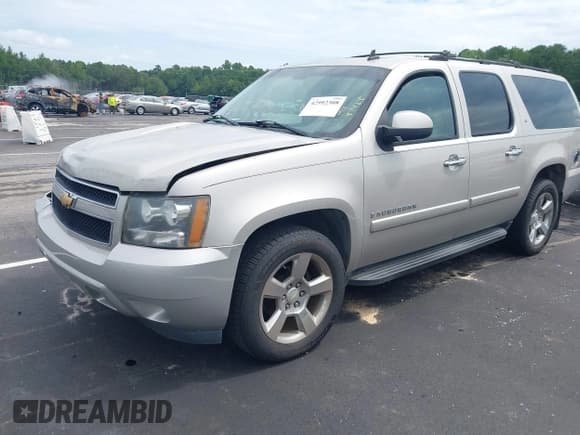 ✅ 2007 Chevrolet Suburban LTZ • VIN: 1GNFC16047R237148 • Lot: 42992308. Listed on IAAI with 248,336 mi. Free auction sales archive from the USA and detailed vehicle history report at DreamBid. Image 2.