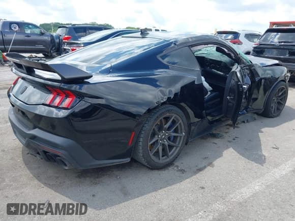 ✅ 2024 Ford Mustang Dark Horse • VIN: 1FA6P8R00R5505811 • Lot: 42894731. Listed on IAAI with 5,395 mi. Free auction sales archive from the USA and detailed vehicle history report at DreamBid. Image 4.