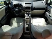 ✅ 2009 Mazda 5 Sport • VIN: JM1CR293690335675 • Lot: 80086135. Listed on Copart with 161,063 mi. Free auction sales archive from the USA and detailed vehicle history report at DreamBid. Image 8.