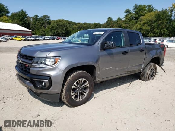 ✅ 2021 Chevrolet Colorado 4WD Z71 • VIN: 1GCGTDEN8M1241774 • Лот: 71227364. Опубликован ранее на Copart с пробегом 49 518 миль. Бесплатный доступ к архиву аукционных продаж из США и подробный отчёт об истории автомобиля на DreamBid. Изображение 1.