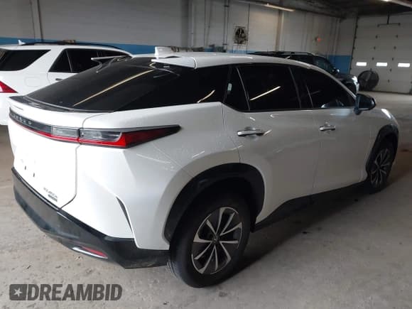 ✅ 2024 Lexus RZ 450e Premium • VIN: JTJAAAAB8RA023733 • Lot: 42319612. Listed on IAAI with 13,907 mi. Free auction sales archive from the USA and detailed vehicle history report at DreamBid. Image 4.