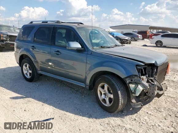 ✅ 2011 Mercury Mariner Premier • VIN: 4M2CN8HG9BKJ08665 • Lot: 85329905. Listed on Copart with 123,967 mi. Free auction sales archive from the USA and detailed vehicle history report at DreamBid. Image 4.
