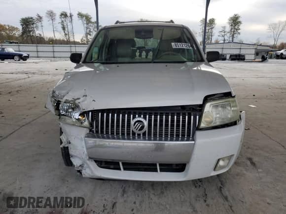 2006 Mercury Mariner Luxury with VIN 4M2CU56136DJ00202, listed as a Copart auction lot 85121264 with 103,242 mi miles and Salvage title. Bid and sale history available at DreamBid. Image 5.