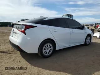 ✅ 2021 Toyota Prius L Eco • VIN: JTDKAMFU4M3141343 • Lot: 91052265. Wystawiony na Copart z przebiegiem 130 421 mil. Bezpłatny archiwum sprzedaży aukcyjnych z USA i szczegółowy raport historii pojazdu na DreamBid. Zdjęcie 3.