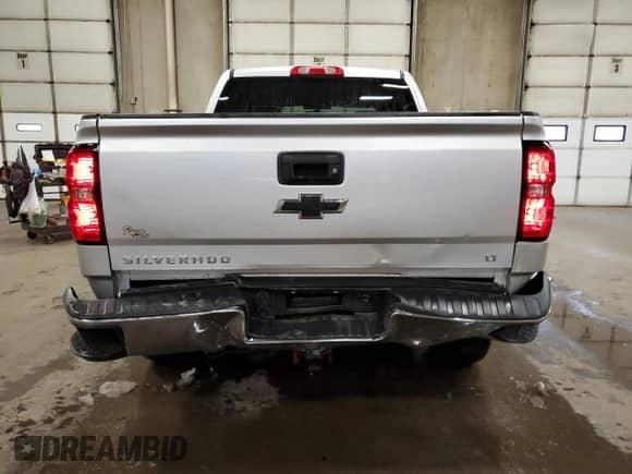 2018 Chevrolet Silverado 1500 LT с VIN 3GCUKRECXJG534137, выставлен на аукционе Copart как лот 78857174 с пробегом 87 590 миль миль и Списание • Salvage title. История ставок и продаж доступна на DreamBid. Изображение 6.