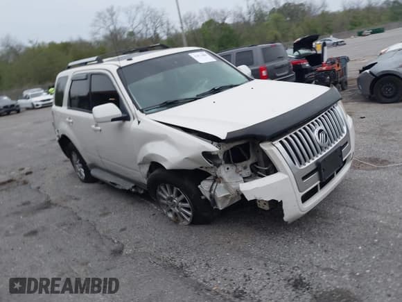 ✅ 2010 Mercury Mariner Premier • VIN: 4M2CN8HG2AKJ06271 • Lot: 41871088. Listed on IAAI with 248,159 mi. Free auction sales archive from the USA and detailed vehicle history report at DreamBid. Image 1.