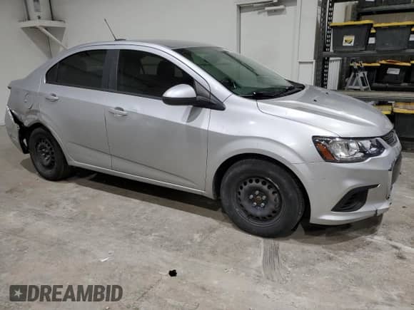 2019 Chevrolet Sonic LS with VIN 1G1JB5SB0K4111243, listed as a Copart auction lot 87002064 with 81,003 mi miles and Salvage title. Bid and sale history available at DreamBid. Image 4.
