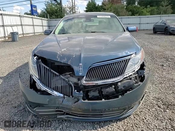✅ 2015 Lincoln MKS EcoBoost • VIN: 1LNHL9FT2FG607545 • Лот: 71344275. Опубликован ранее на Copart с пробегом 161 509 миль. Бесплатный доступ к архиву аукционных продаж из США и подробный отчёт об истории автомобиля на DreamBid. Изображение 13.