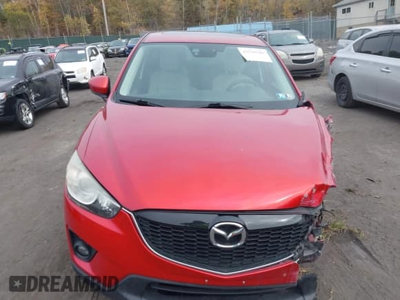 ✅ 2014 Mazda CX-5 Touring • VIN: JM3KE4CY8E0343530 • Lot: 43549628. Listed on IAAI with 133,032 mi. Free auction sales archive from the USA and detailed vehicle history report at DreamBid. Image 13.